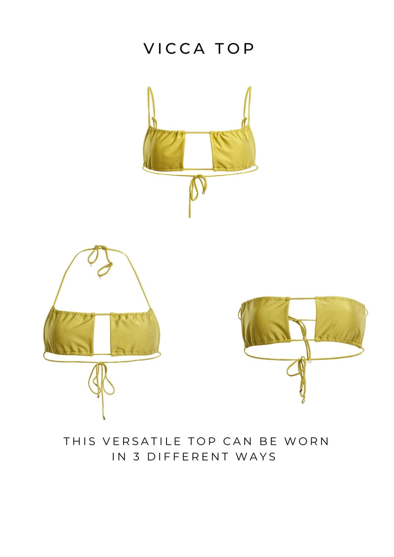 Vicca top. An adjustable and yellow top with golden details.
